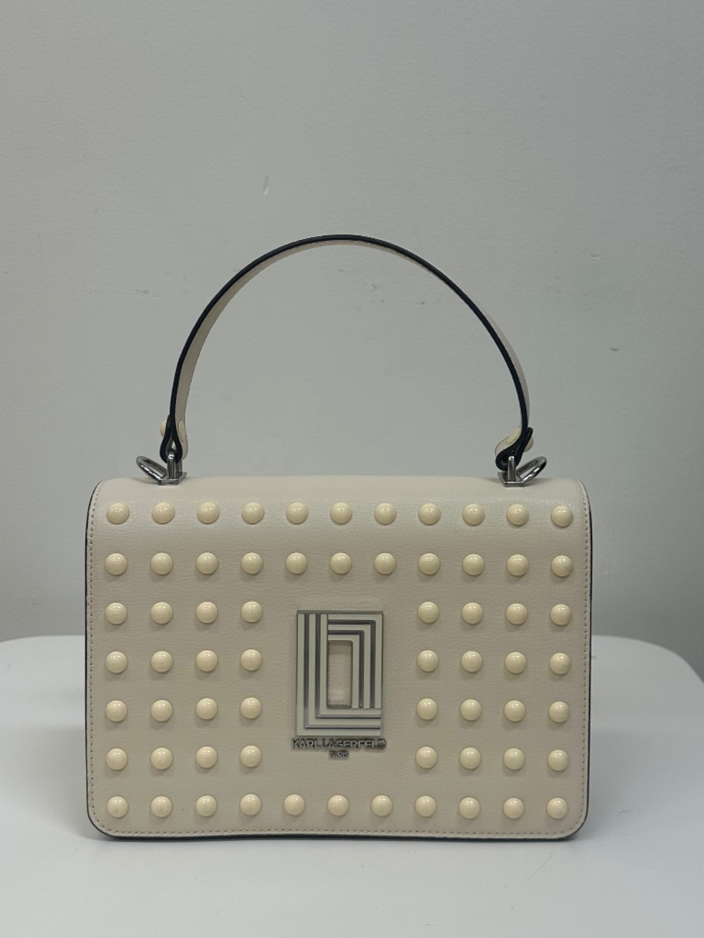 Karl Lagerfeld Paris Ivory Studded Top-Handle Bag.